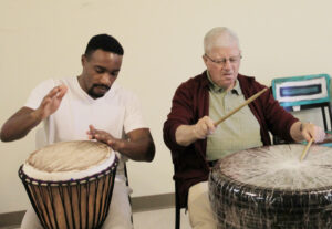 two men drumming